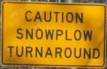 cautionsnowplowturnaround-snowplow-close.jpg