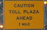 cautiontollplazaahead-tollplaza-close.jpg