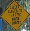 streetclosedtotrafficwhenflooded-flooded-close.jpg