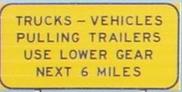 trucksvehiclespullingtrailersuselowergearnext6miles.jpg